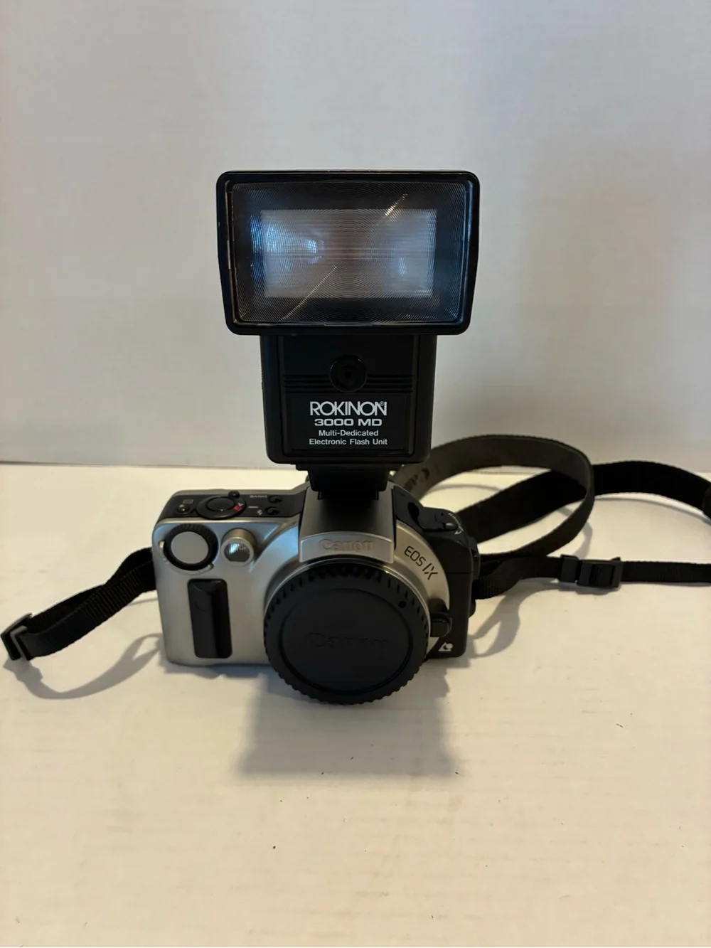 Canon EOS IX E AF 35mm SLR Film Camera Body and flash.